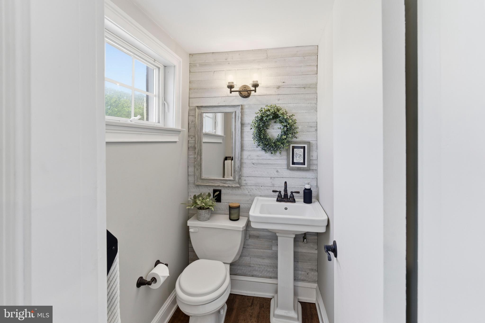 447 Maddock Road Springfield, PA 19064 - Photo 32 of 42 a bathroom with a sink toilet and a mirror