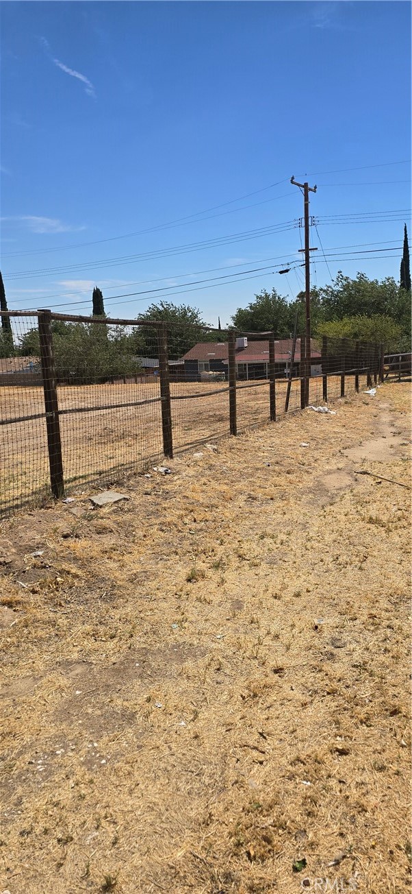 308 East Ave R8 Palmdale, CA 93550 - Photo 17 of 19 a view of a lake with sunset