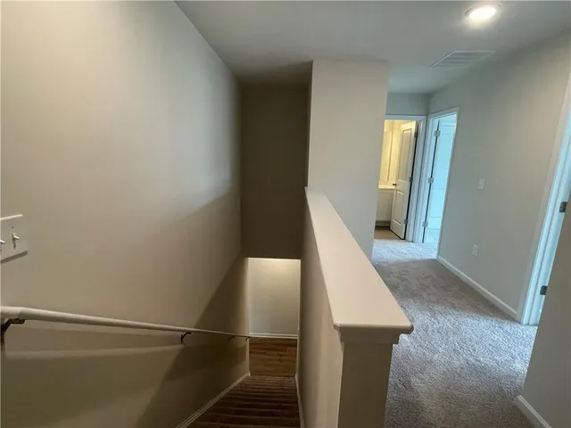 a view of entryway with wooden floor