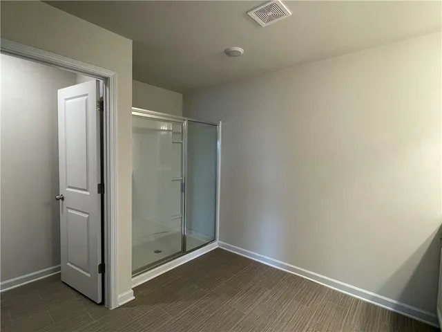 a view of a room with racks on the wall