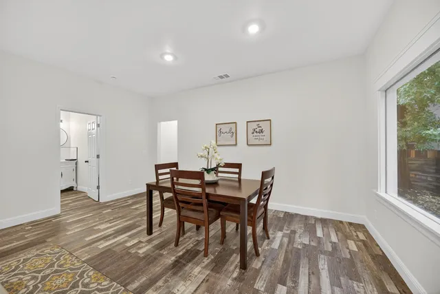 a view of a dining room with furniture