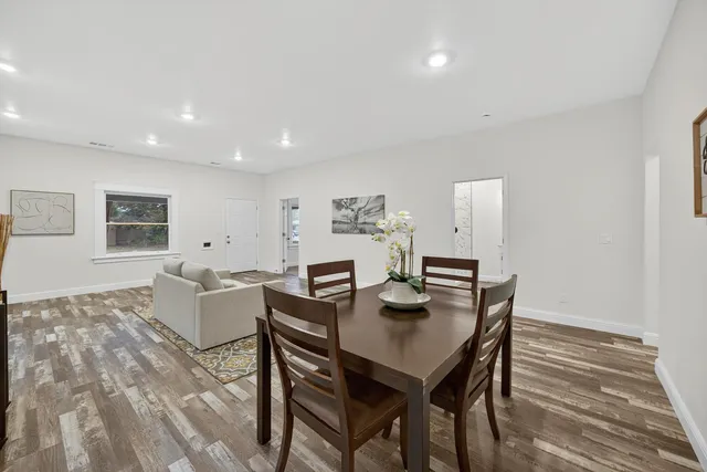 a view of a dining room with furniture