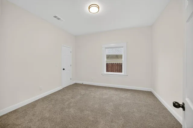 an empty room with window