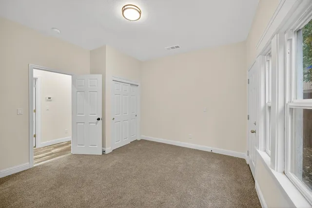 a kitchen with sink and window