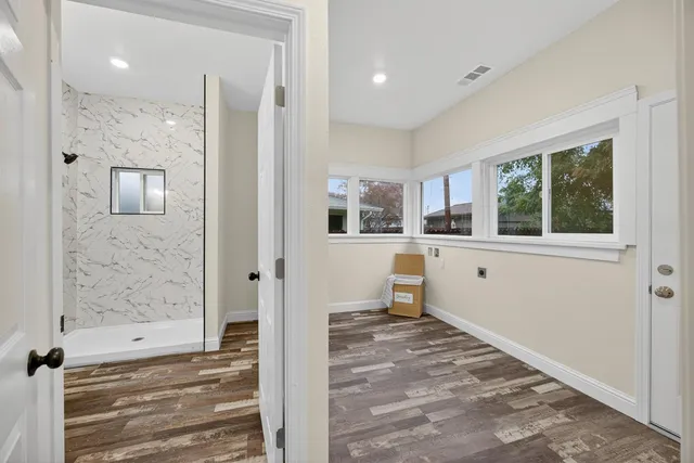 a view of a room with a window