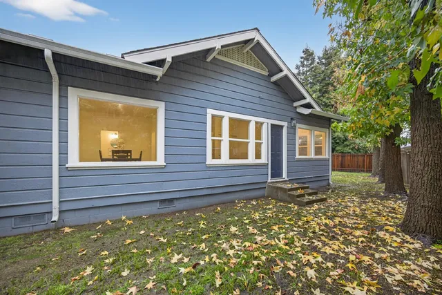 a view of backyard with green space