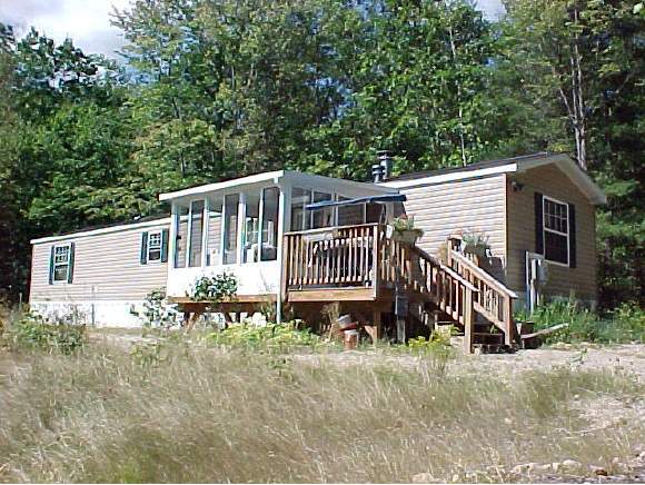 778 Fowler River Road Alexandria, NH 03222 - Photo 1 of 9