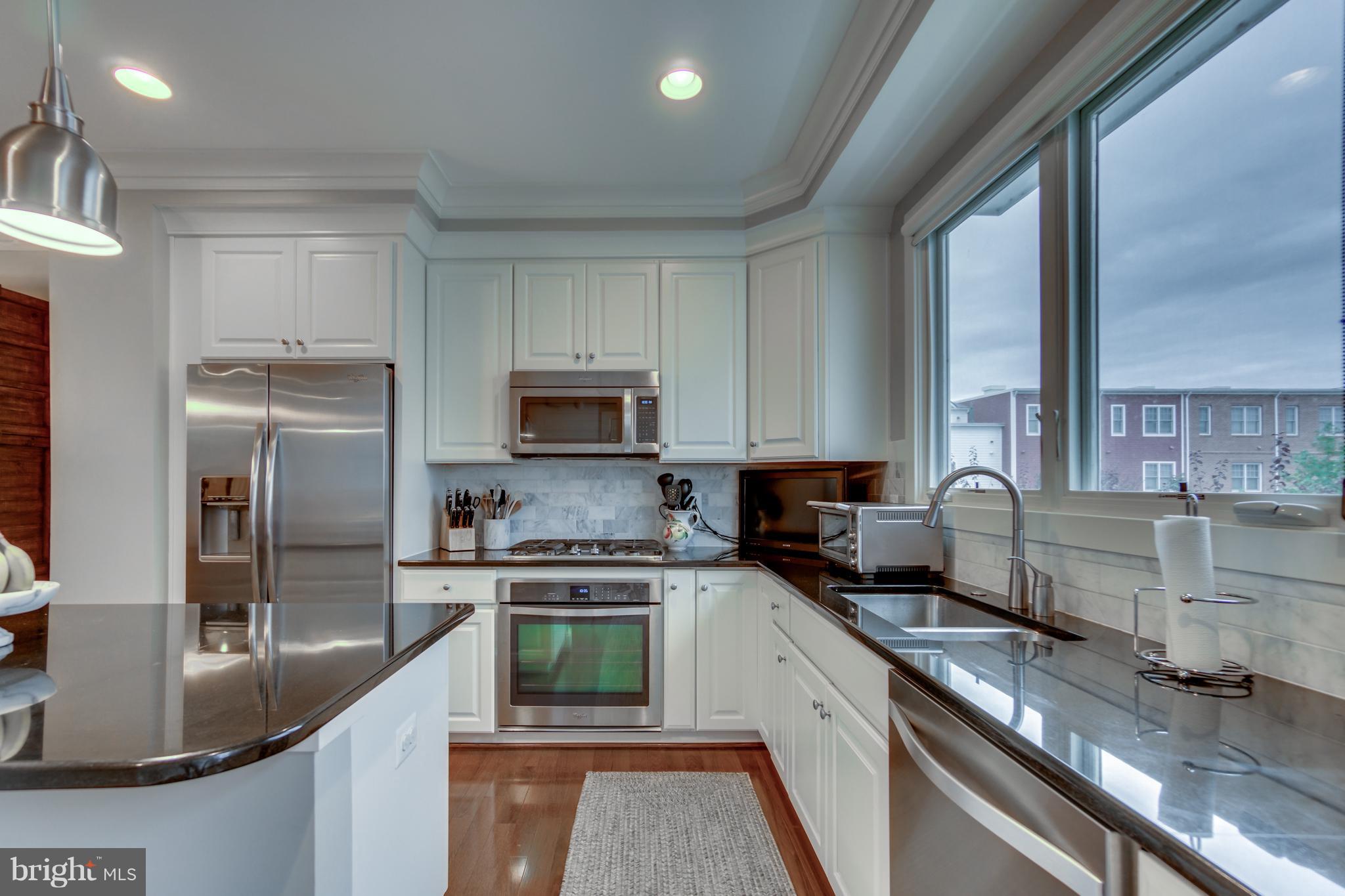 826 First Street Alexandria, VA 22314 - Photo 8 of 31 42in soft close cabinets, stainless app, granite