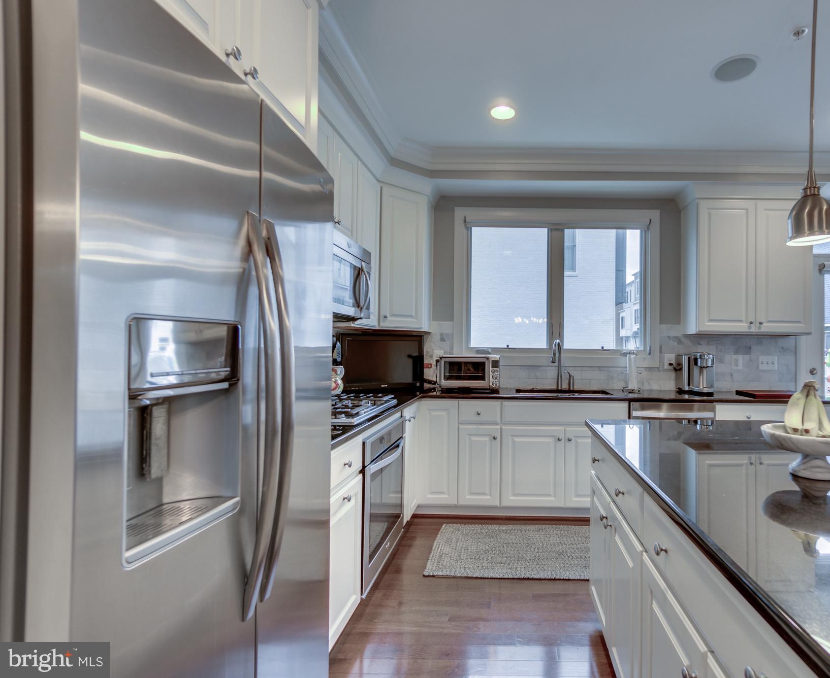 826 First Street Alexandria, VA 22314 - Photo 9 of 31 Plenty of cabinet space and great natural light!
