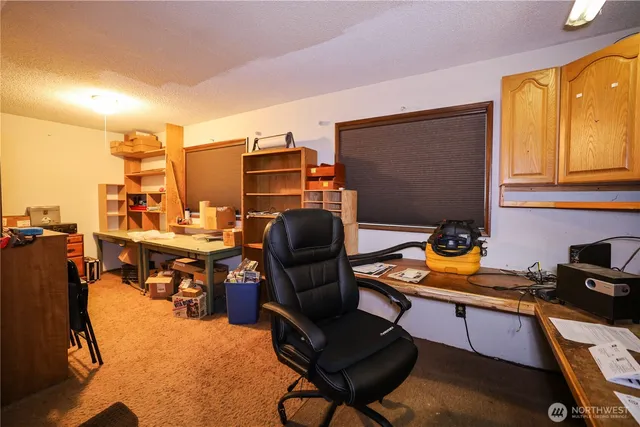 a room with furniture and a flat screen tv