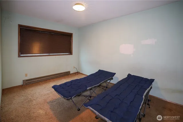 a view of a livingroom with furniture