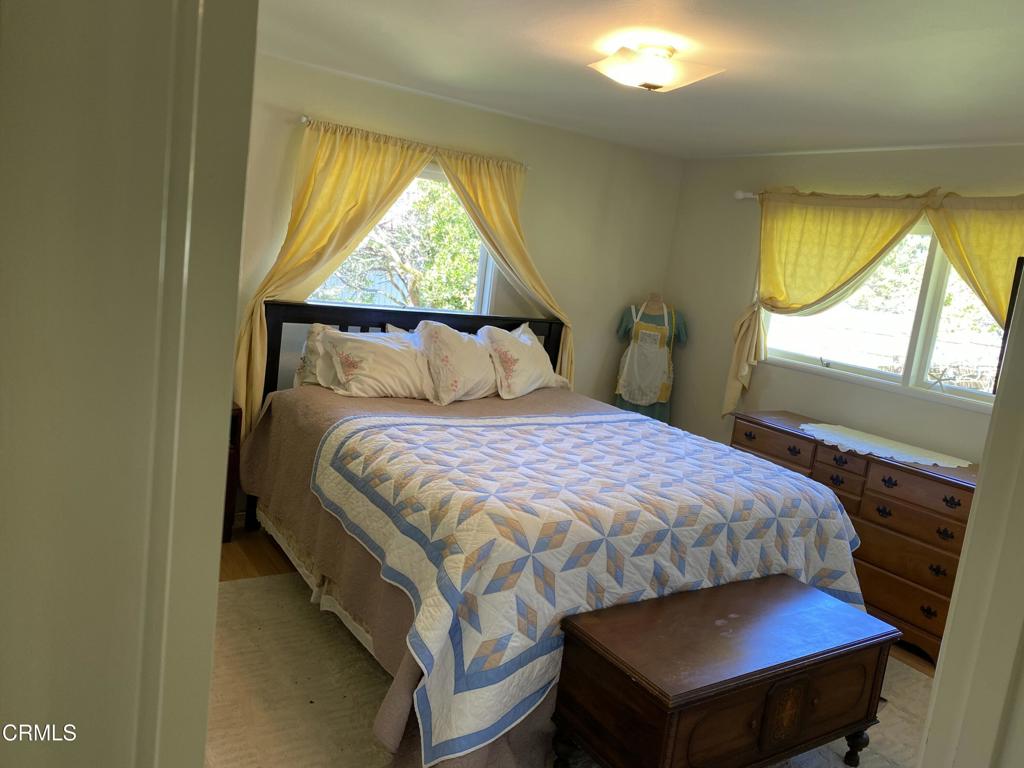 31400 Sherwood Road Fort Bragg, CA 95437 - Photo 29 of 55 a bedroom with a bed and a window