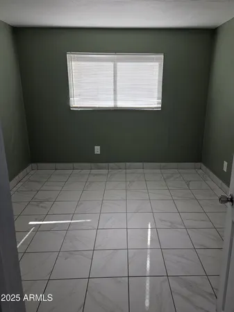 a bathroom with a bathtub and a toilet