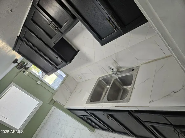 a close up of a sink in the kitchen