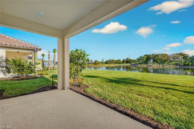 a view of a house with a big yard