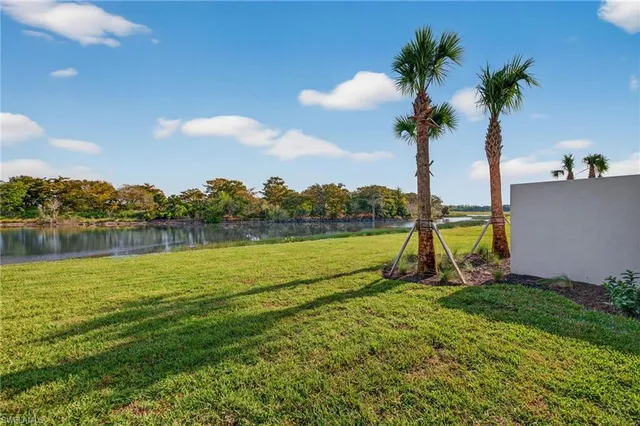 a view of a lake with a big yard