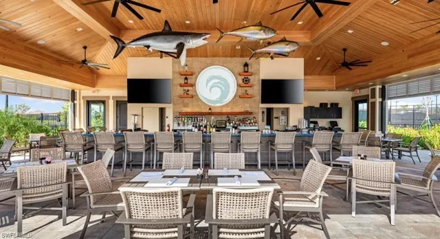 a view of a patio with couches table and chairs
