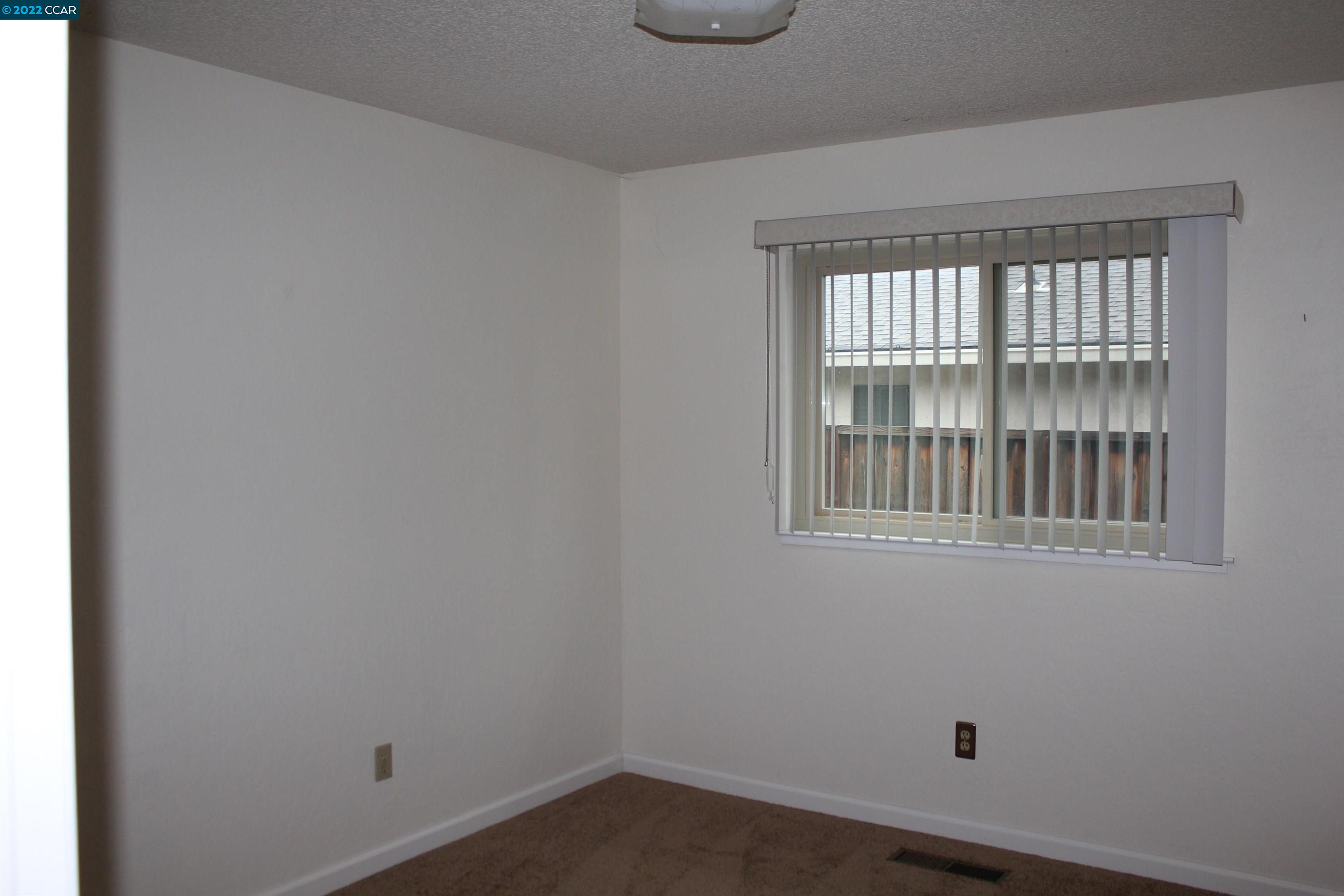 5328 Paso Del Rio Way Concord, CA 94521 - Photo 20 of 22 a room that has a window in it