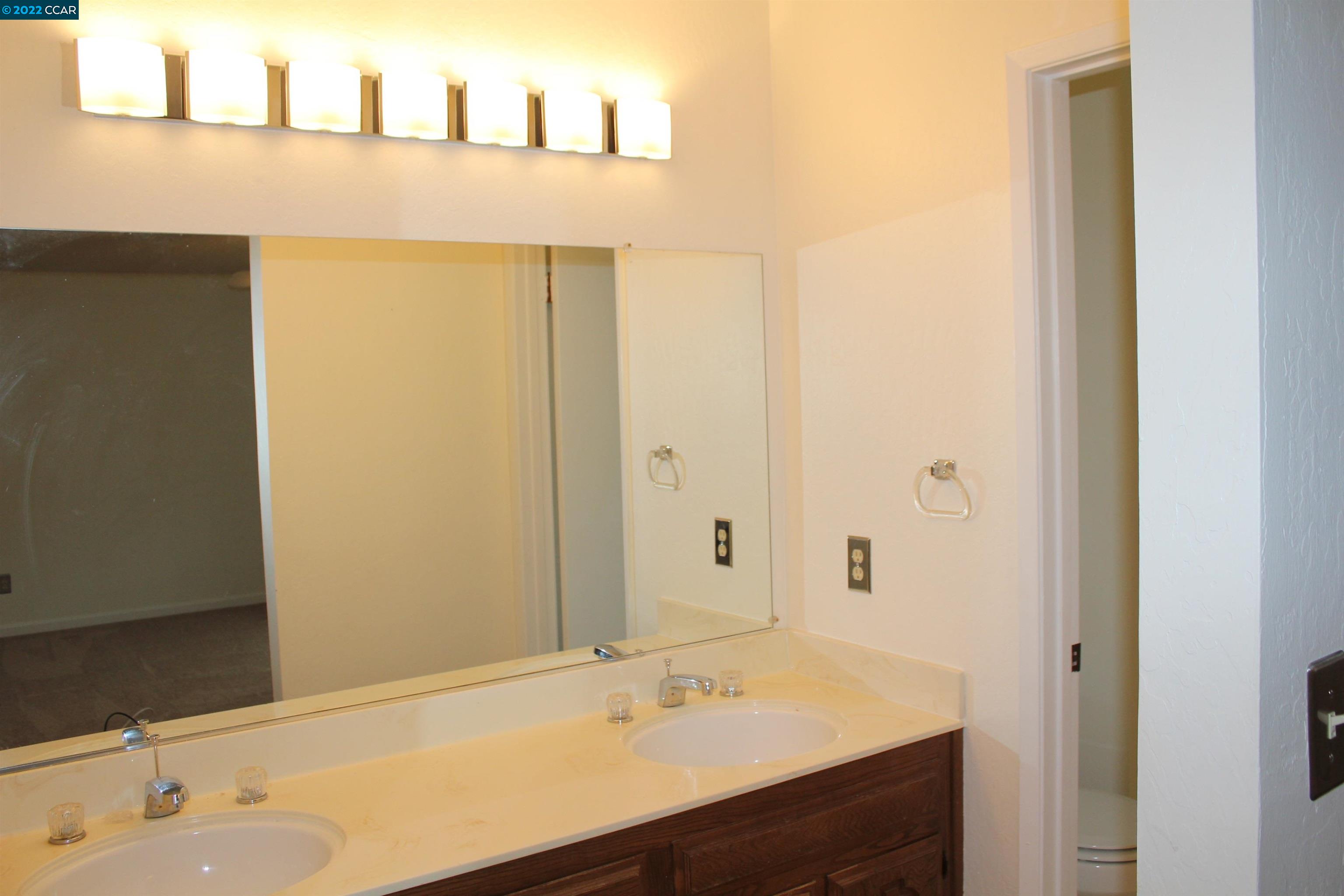 5328 Paso Del Rio Way Concord, CA 94521 - Photo 10 of 22 a bathroom with a sink and a mirror