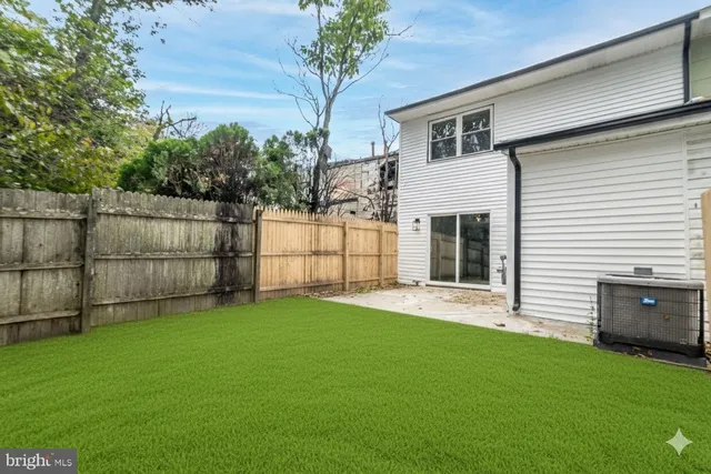 a view of a backyard with a garden