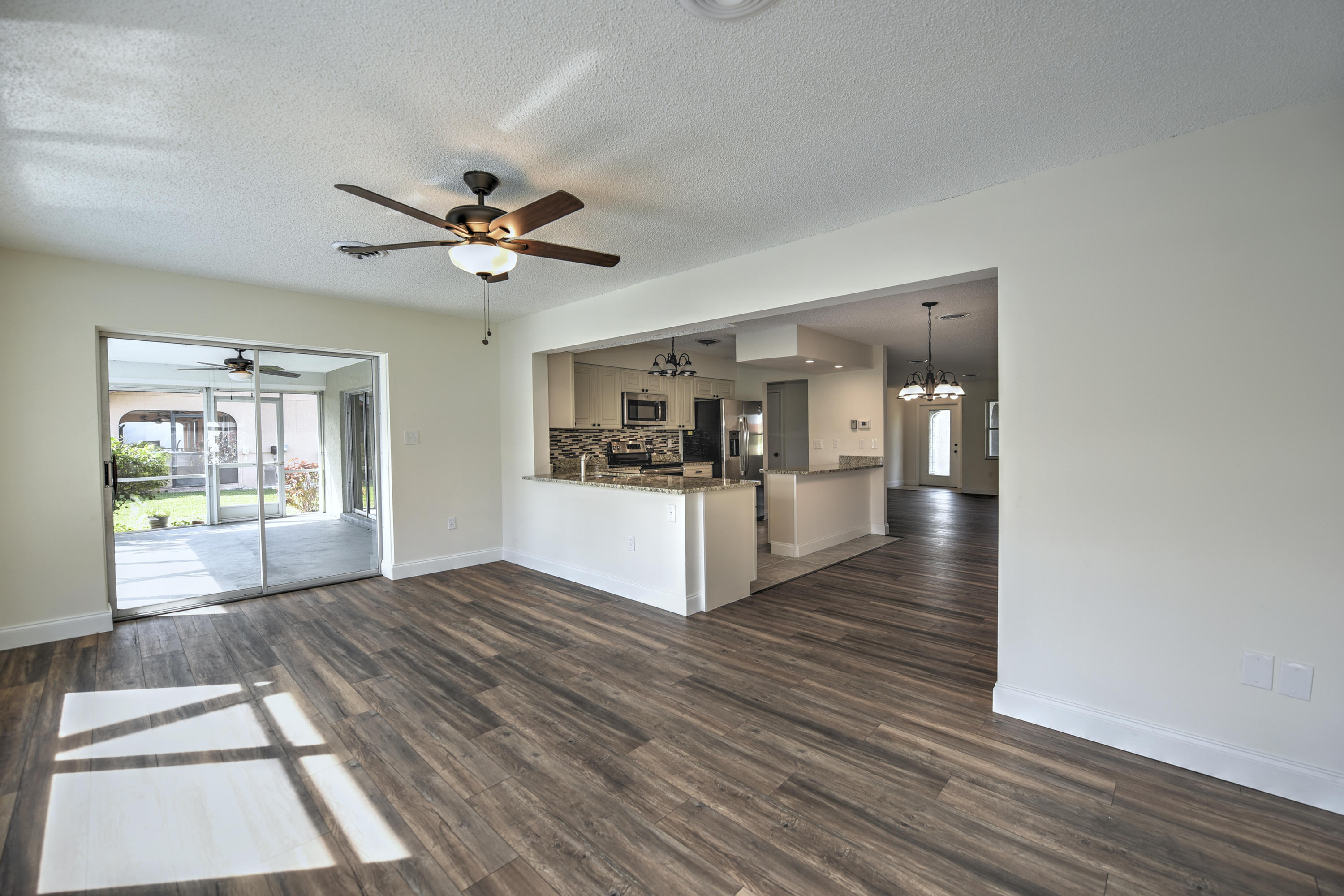 152 Caddy Road Rotonda West, FL 33947 - Photo 11 of 29 11 Family Room