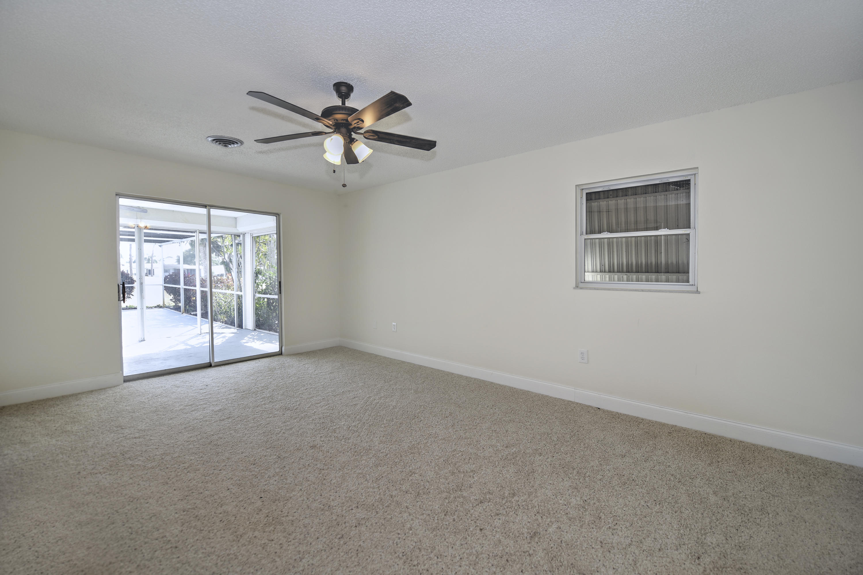 152 Caddy Road Rotonda West, FL 33947 - Photo 16 of 29 16 Master Bedroom