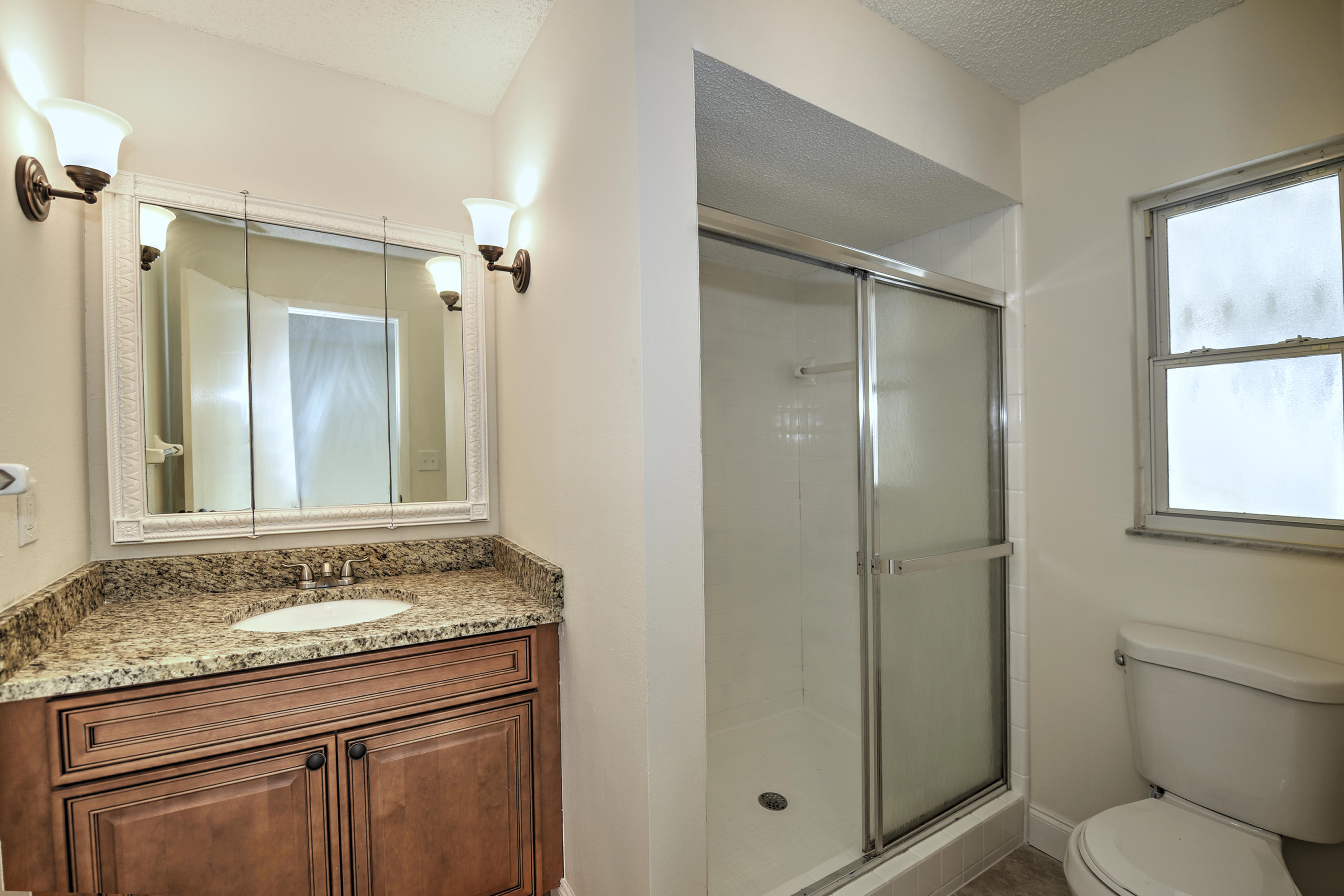 152 Caddy Road Rotonda West, FL 33947 - Photo 17 of 29 17 Master Bathroom