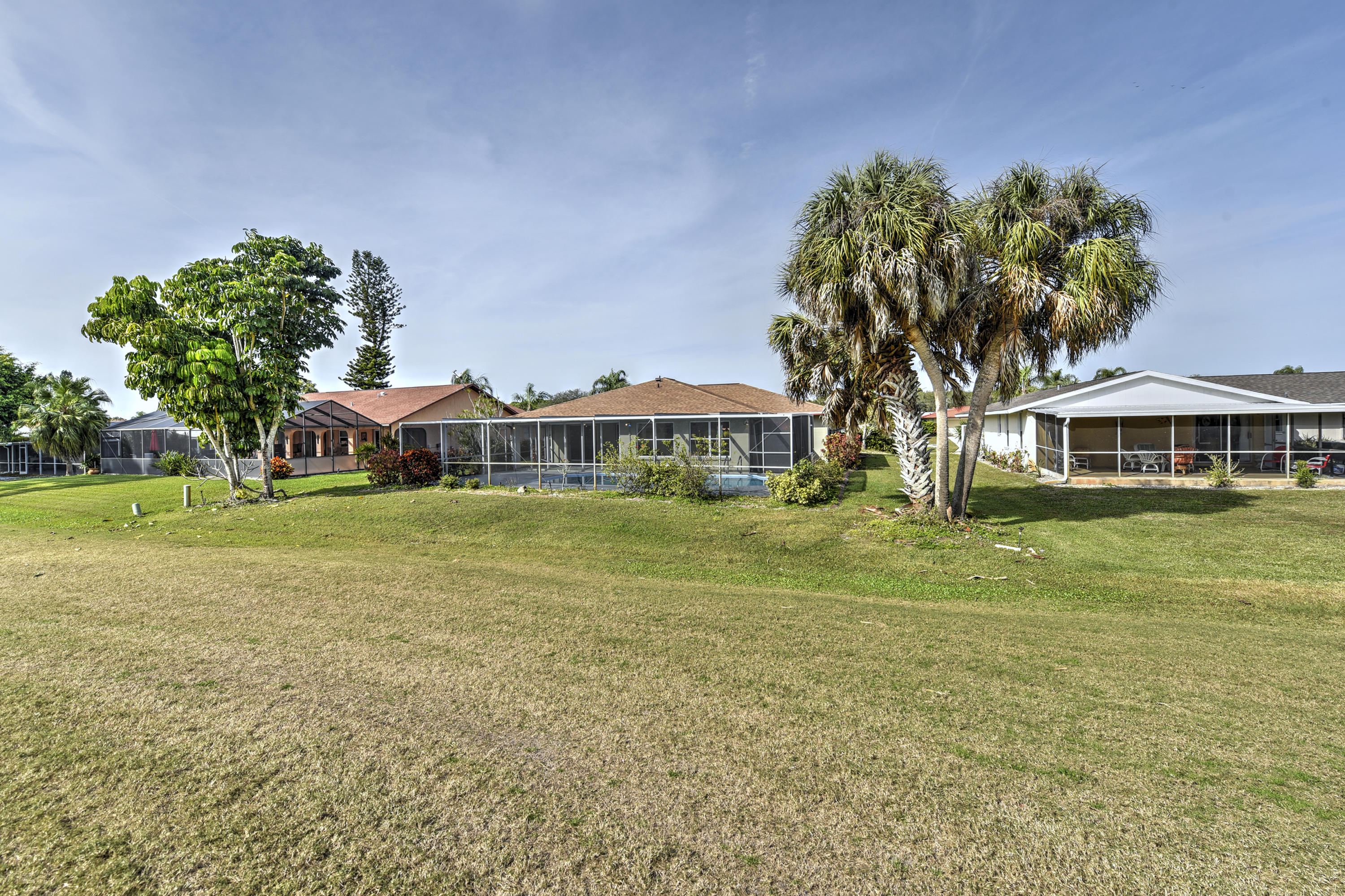 152 Caddy Road Rotonda West, FL 33947 - Photo 25 of 29 25 Exterior Back
