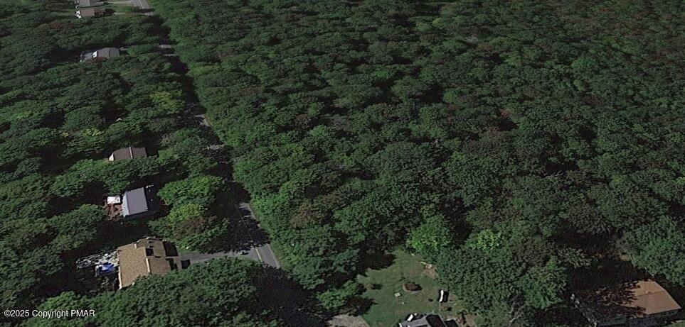 6115 Apache Trail Tobyhanna, PA 18466 - Photo 3 of 5 an aerial view of residential house with outdoor space and trees all around