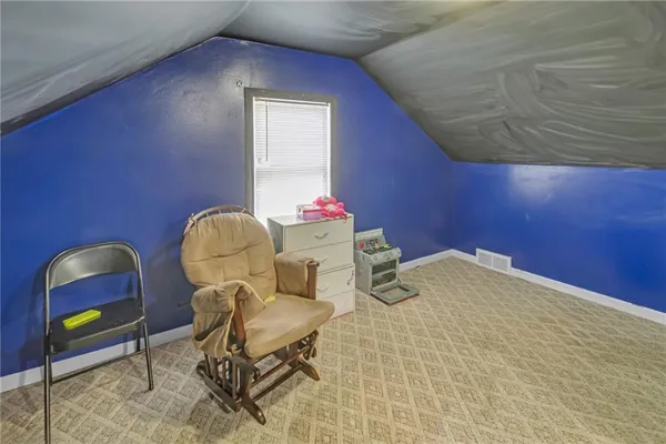a workspace with furniture and window