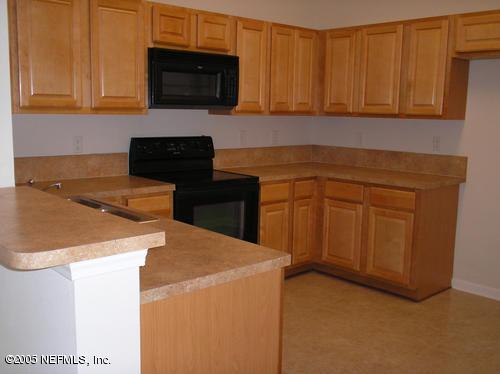7920 Merrill Road, Unit 107 Jacksonville, FL 32277 - Photo 3 of 9 Kitchen View 1