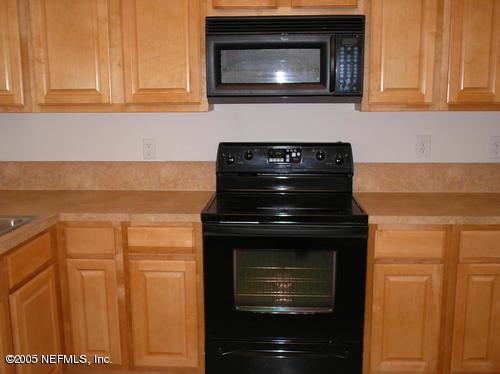 7920 Merrill Road, Unit 107 Jacksonville, FL 32277 - Photo 4 of 9 Kitchen View 2