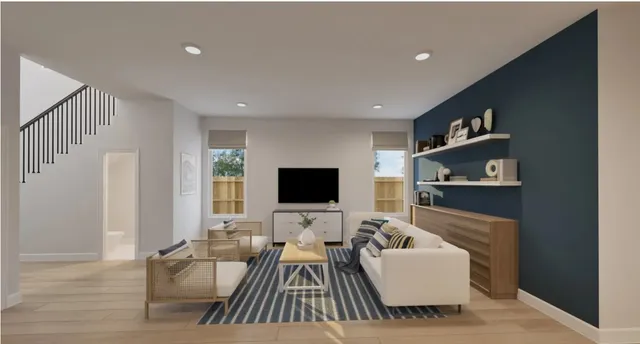 a view of a patio with table and chairs