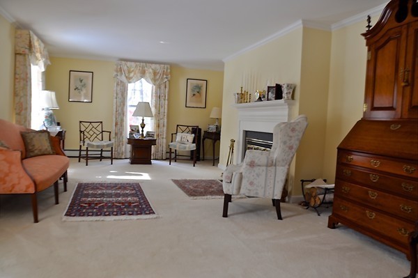 11 Pond Street Dover, MA 02030 - Photo 3 of 12 a living room with furniture and a window