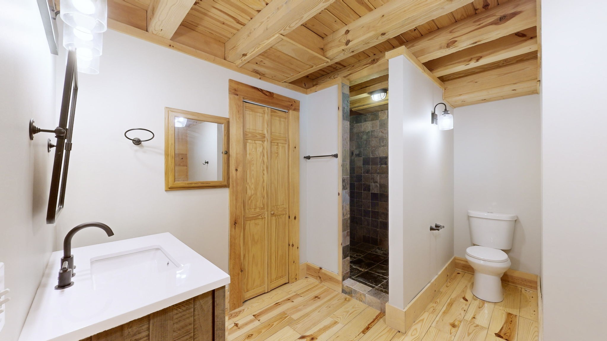 256 Vista Vue Trail Pelham, TN 37366 - Photo 48 of 67 a bathroom with a sink a toilet and shower