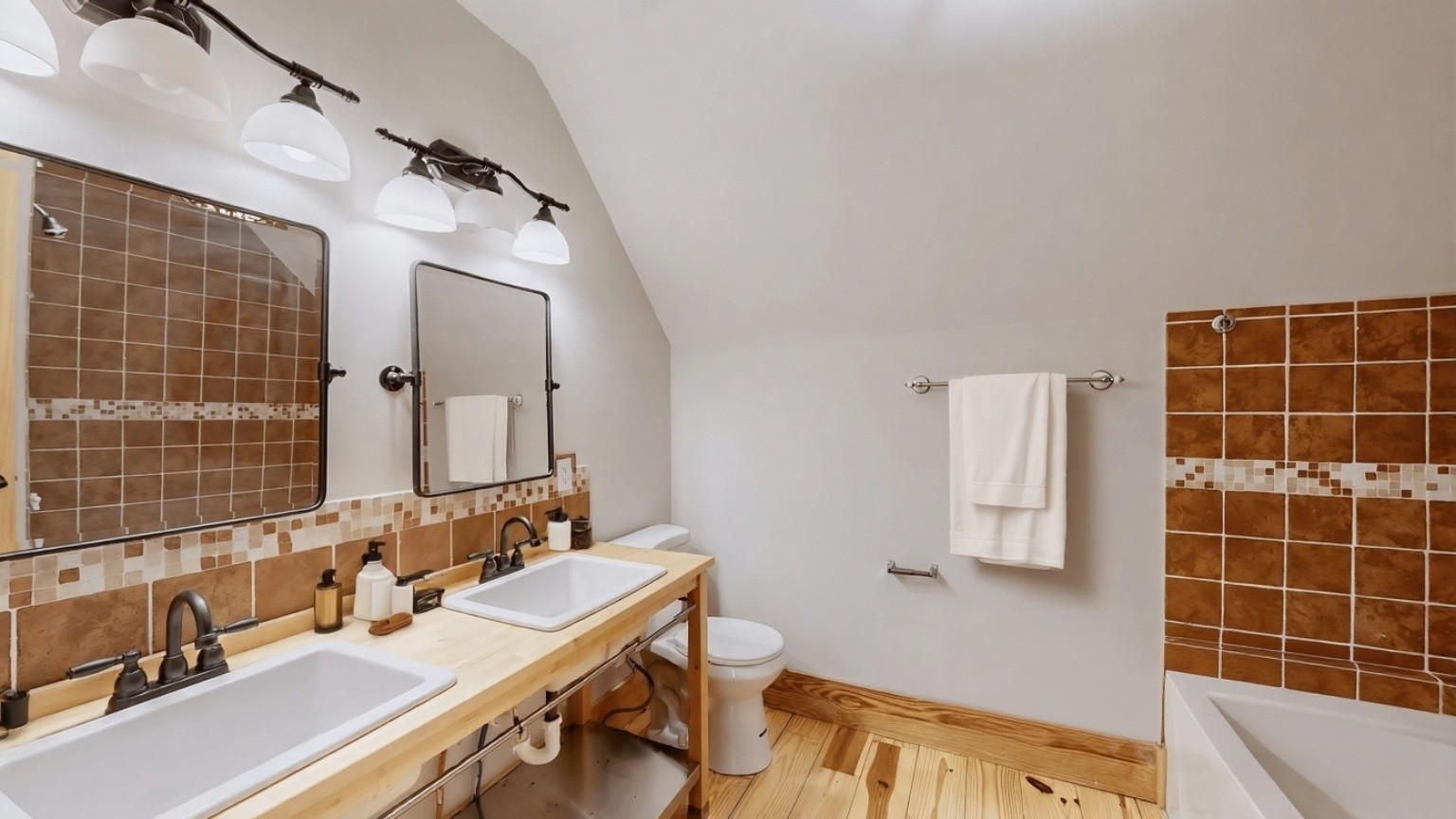 256 Vista Vue Trail Pelham, TN 37366 - Photo 51 of 67 a bathroom with a double vanity sink a mirror and a bathtub