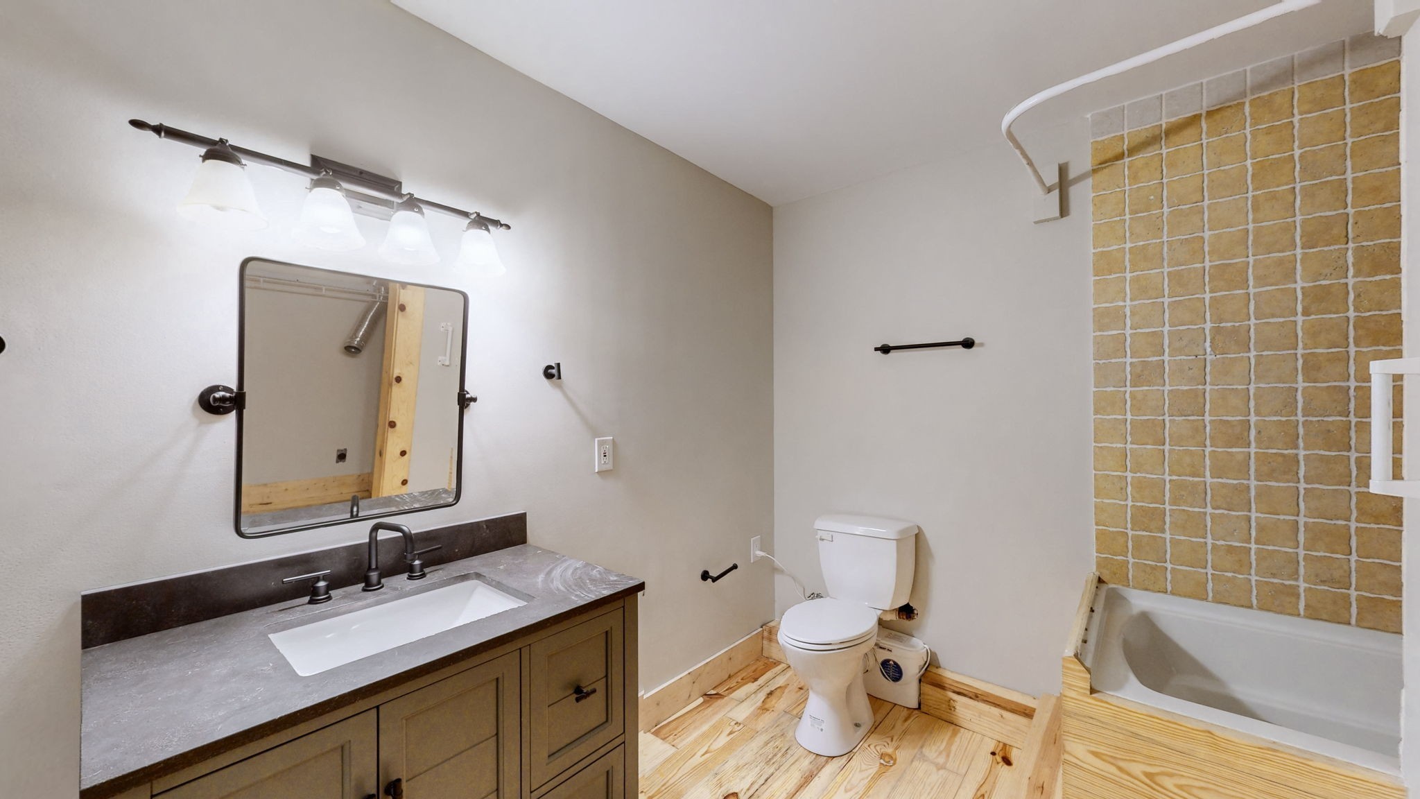 256 Vista Vue Trail Pelham, TN 37366 - Photo 57 of 67 a bathroom with a granite countertop sink mirror vanity and toilet