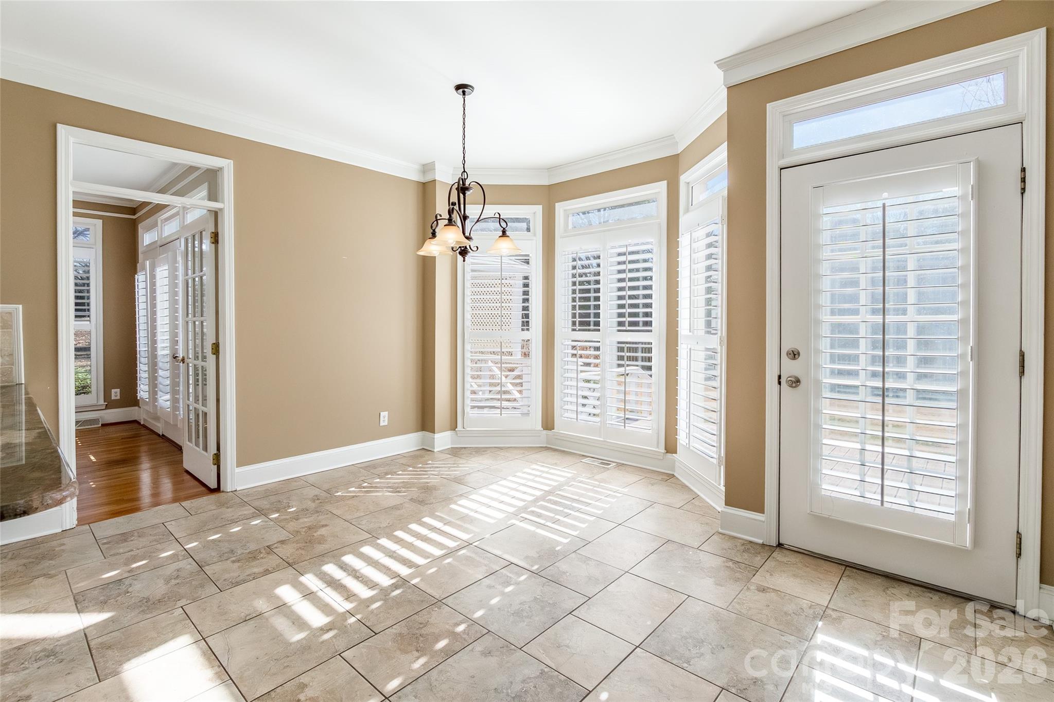 1909 Malvern Road Rock Hill, SC 29732 - Photo 12 of 40 a view of a livingroom with a chandelier and dining area view
