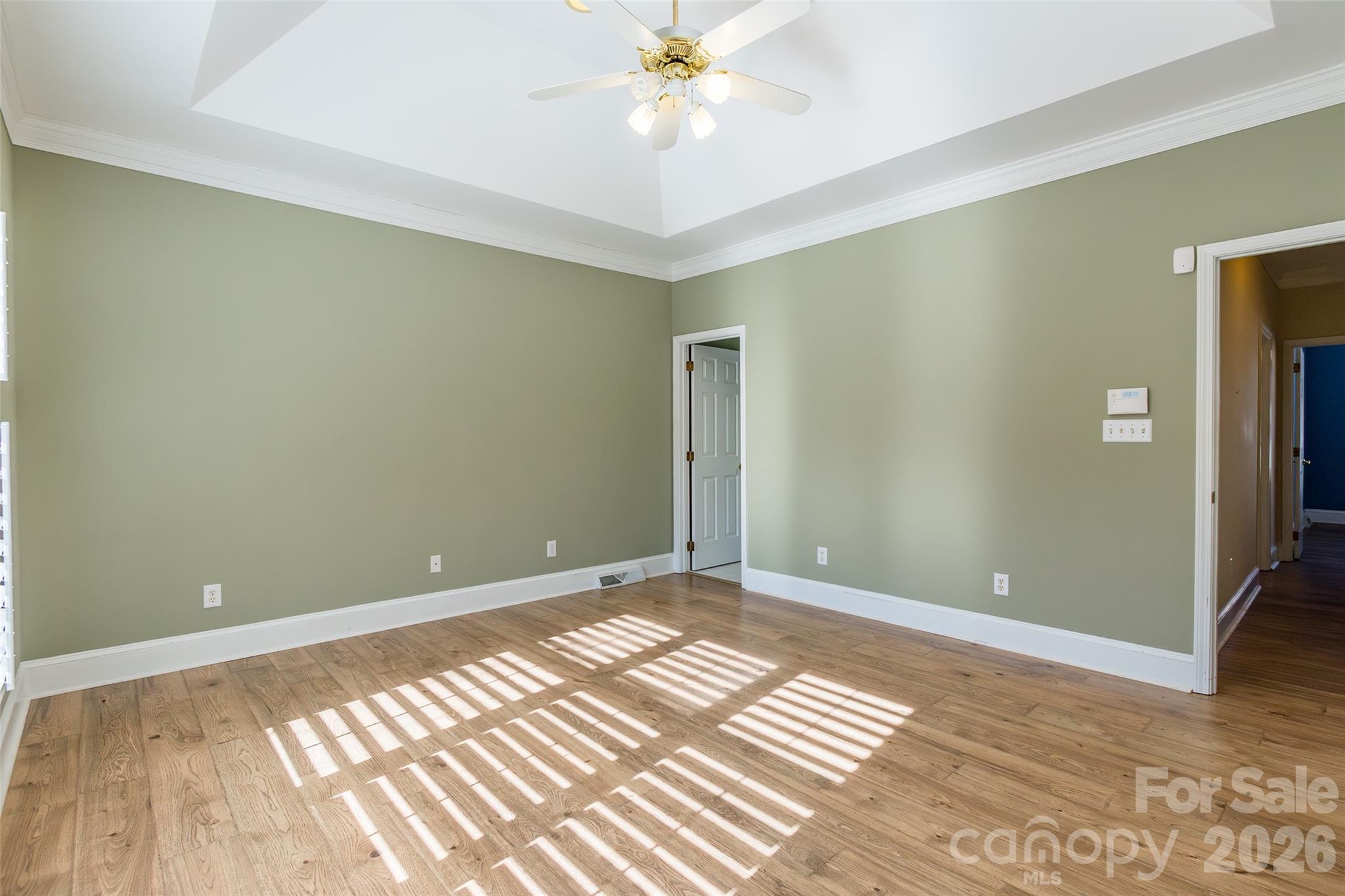 1909 Malvern Road Rock Hill, SC 29732 - Photo 20 of 40 a view of an empty room with window and wooden floor