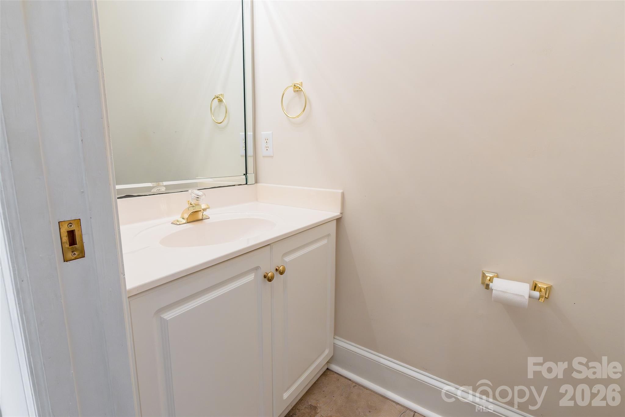 1909 Malvern Road Rock Hill, SC 29732 - Photo 30 of 40 a bathroom with a sink and mirror