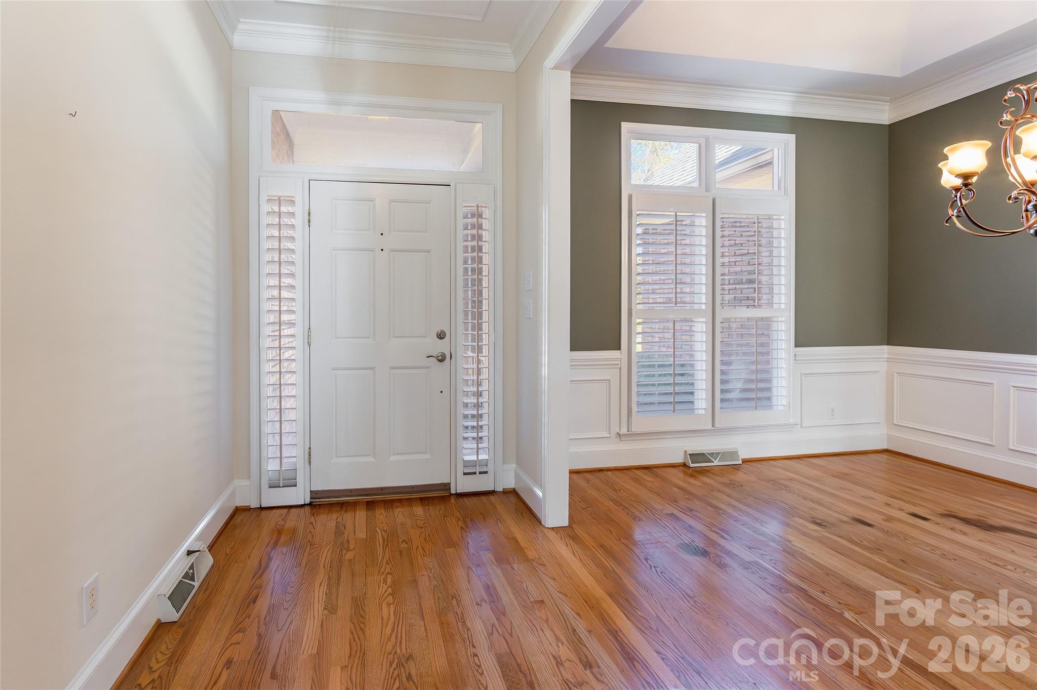1909 Malvern Road Rock Hill, SC 29732 - Photo 5 of 40 an empty room with wooden floor and windows