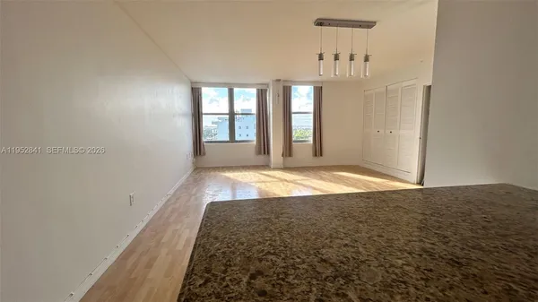 an empty room with windows