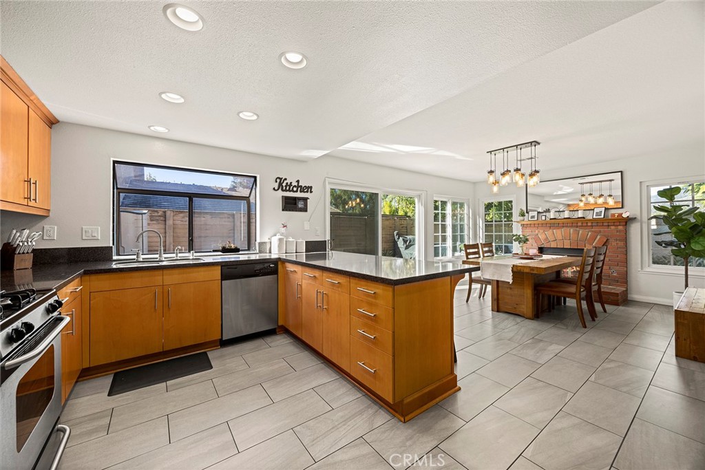 2027 Cobblefield Way Glendora, CA 91740 - Photo 13 of 34 a kitchen with stainless steel appliances granite countertop a sink and cabinets