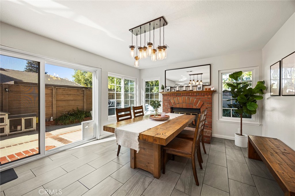 2027 Cobblefield Way Glendora, CA 91740 - Photo 16 of 34 a dining room with furniture a livingroom and chandelier