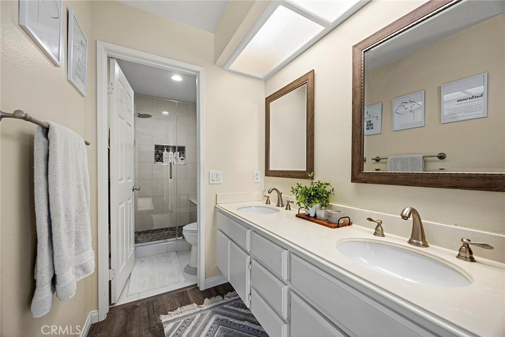 2027 Cobblefield Way Glendora, CA 91740 - Photo 21 of 34 a bathroom with a sink and a mirror