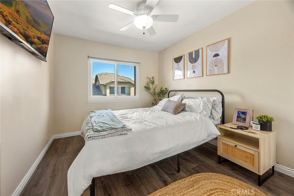 2027 Cobblefield Way Glendora, CA 91740 - Photo 22 of 34 a bedroom with a bed and a chandelier