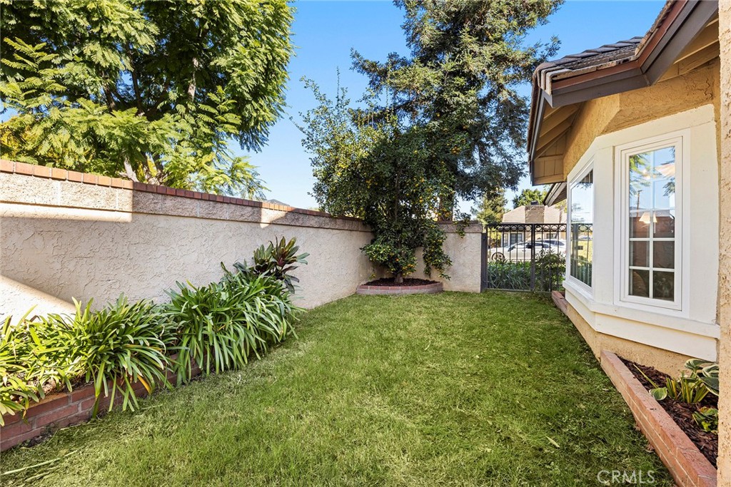 2027 Cobblefield Way Glendora, CA 91740 - Photo 29 of 34 a view of a yard in front of a house with a fountain