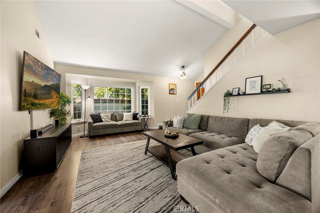 2027 Cobblefield Way Glendora, CA 91740 - Photo 4 of 34 a living room with furniture wooden floor and a flat screen tv