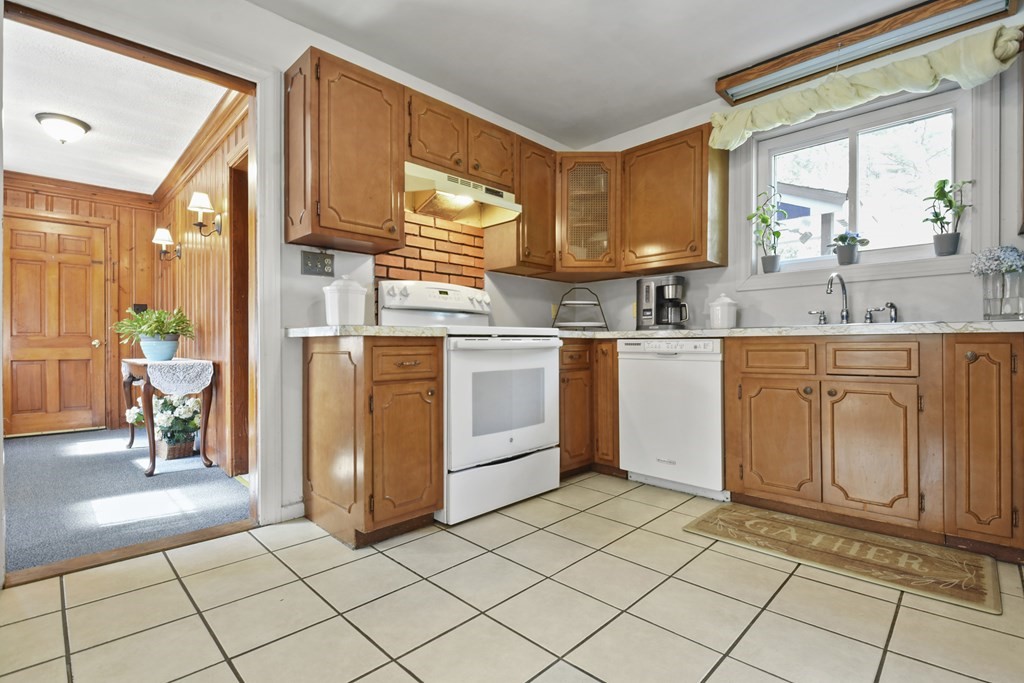 68 Winchendon Road Templeton, MA 01436 - Photo 3 of 30 a kitchen with a sink a stove cabinets and counter space