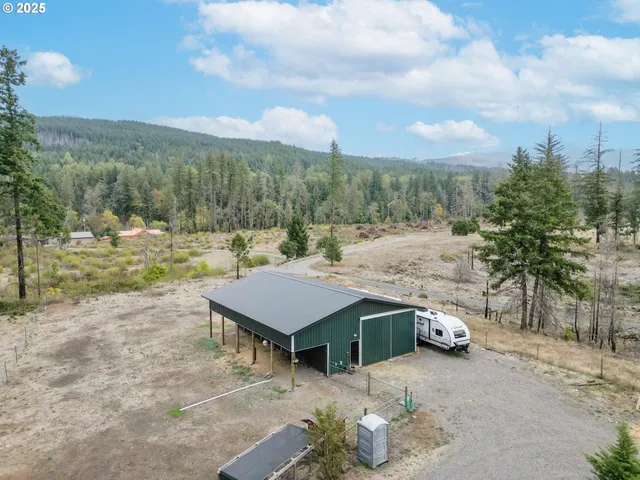 a small pool with a table and chairs